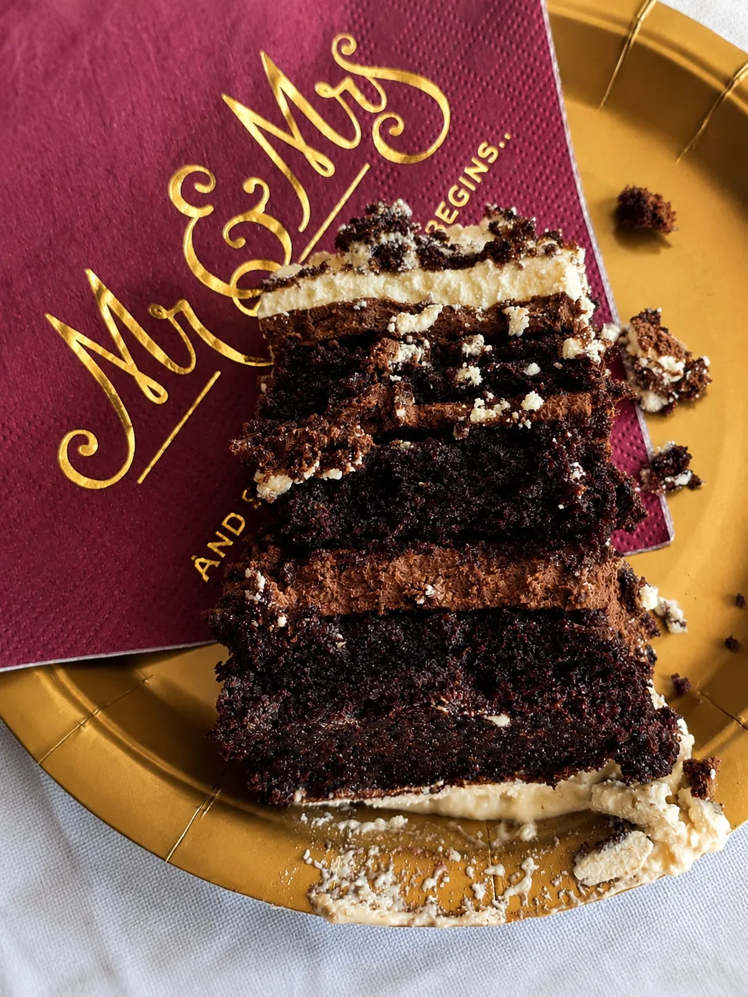 Layered chocolate celebration cake slice